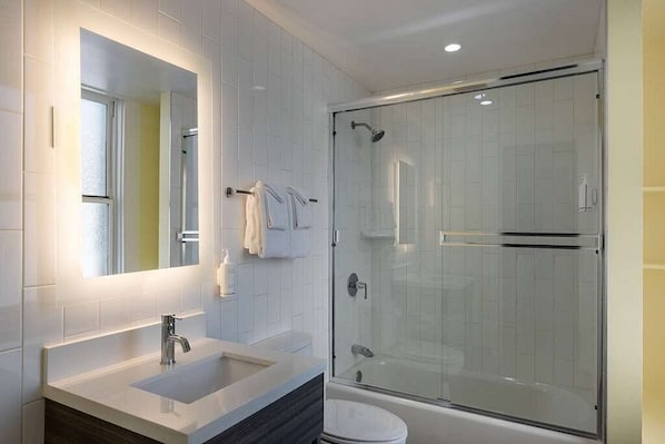 Hair dryer, towels, soap, toilet paper