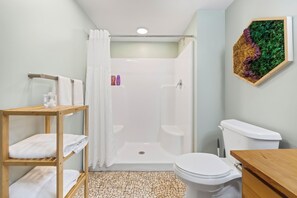 Shower, towels, soap, toilet paper