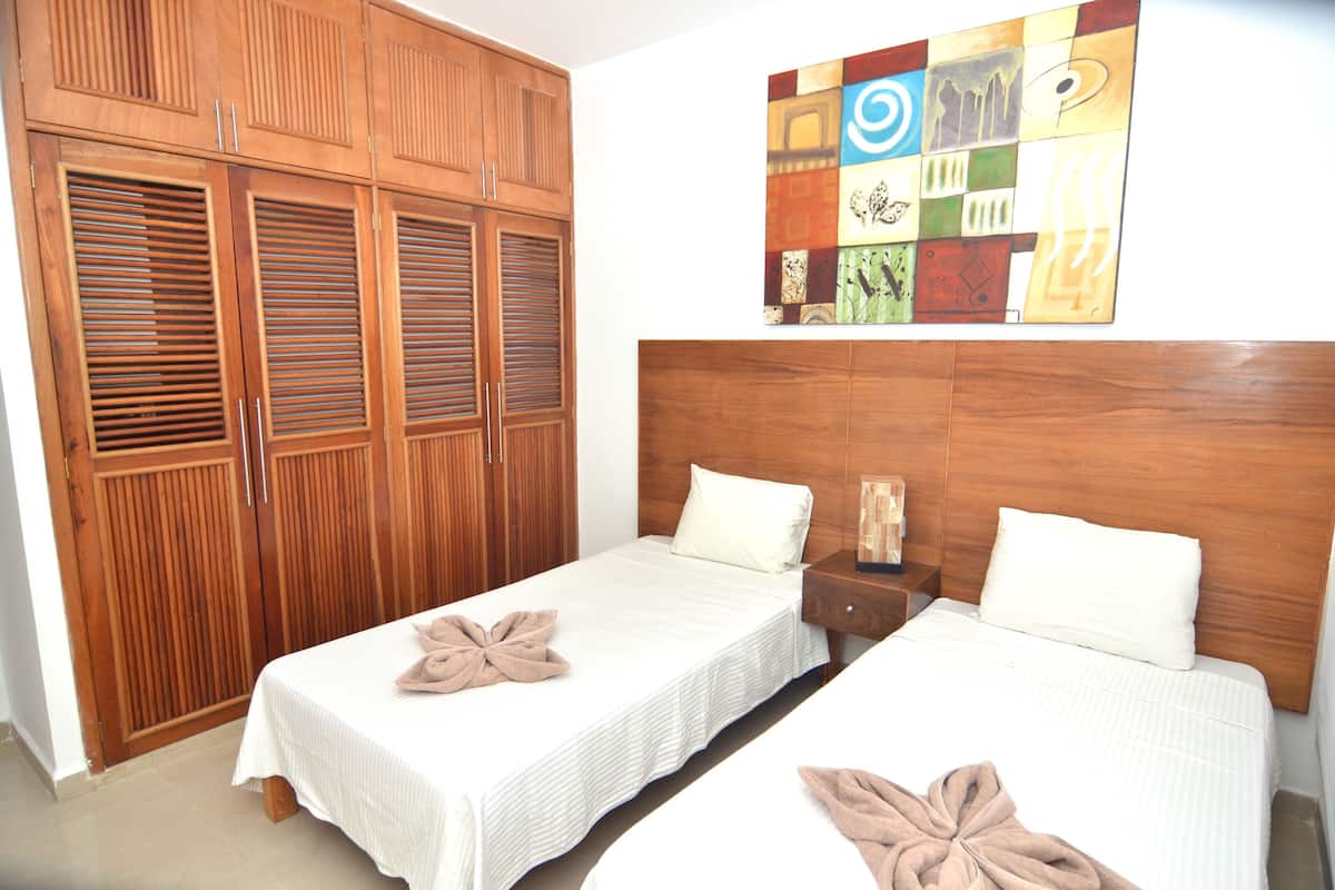 Departamento familiar, balcón, vista a la ciudad | 2 habitaciones, escritorio y wifi gratis