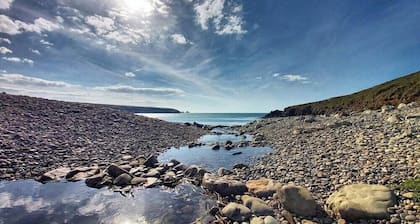 A beautifully restored Welsh farmhouse nestled in the Pembrokeshire countryside close to the coast