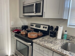 Microwave, oven, stovetop, dishwasher - Cozy Home Downtown- easy access to Greystone Amphitheater, ATL Airport, 6 Flags+ (Douglasville)