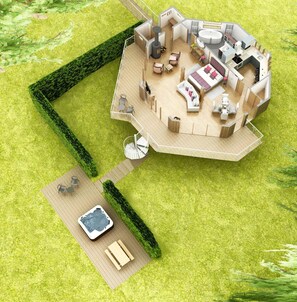 Una casa moderna de varios niveles con un patio central, un jacuzzi y una escalera en espiral.