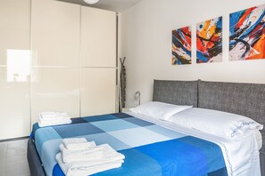 1 bedroom, desk, iron/ironing board, bed sheets