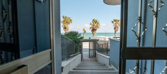 GuestHost - Spacious and cosy 40 sqm flat, sleeping up to 4 people, on the 1st floor of a house (WITHOUT LIFT with steps to access it).The property is located on the Lungomare Cristoforo Colombo promenade, where you can enjoy a wonderful walk to the Port