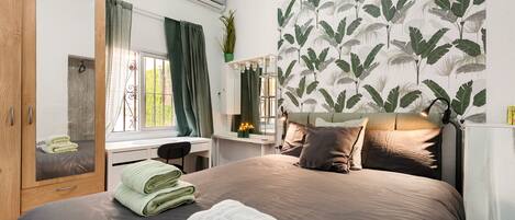 2 عدّة غرف نوم ومكواة/لوح كي وواي فاي مجانًا وملاءات أسرّة