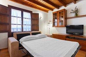 1 habitación, tabla de planchar con plancha, wifi gratis y ropa de cama 