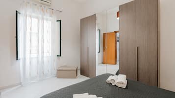 1 habitación, tabla de planchar con plancha, wifi gratis y ropa de cama