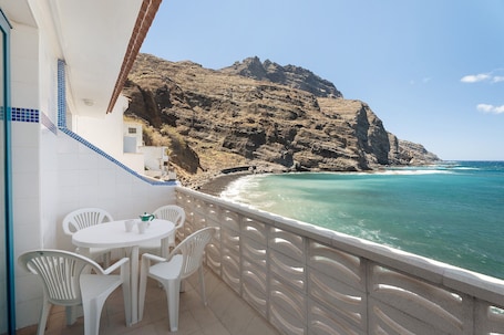 Outdoor dining. Apartment 'Playa Azul - 7' with Sea View, Private Terrace and Wi-Fi