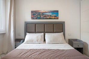 1 habitación, tabla de planchar con plancha, wifi gratis y ropa de cama 