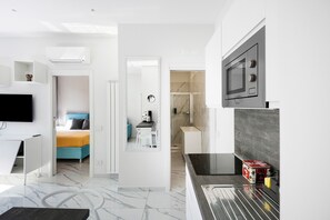1 habitación, tabla de planchar con plancha, wifi gratis y ropa de cama 