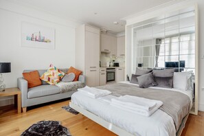1 bedroom, desk, iron/ironing board, travel cot