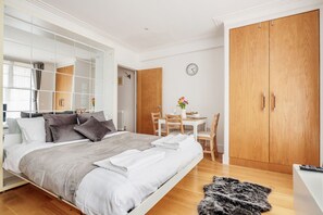 1 bedroom, desk, iron/ironing board, travel cot