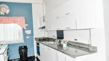 Fridge, coffee/tea maker, toaster, blender