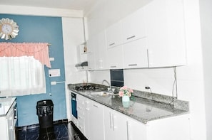 Fridge, coffee/tea maker, toaster, blender