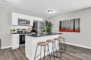 Private kitchen - Modern & Cozy 2BR Home - Queen Beds + Workspace + Parking + WiFi Perfect stay! (Lawrence)