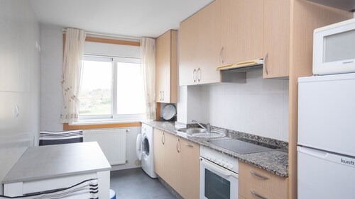 AG Flat Xazmíns Carballo