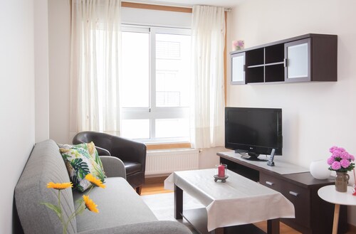 AG Flat Xazmíns Carballo