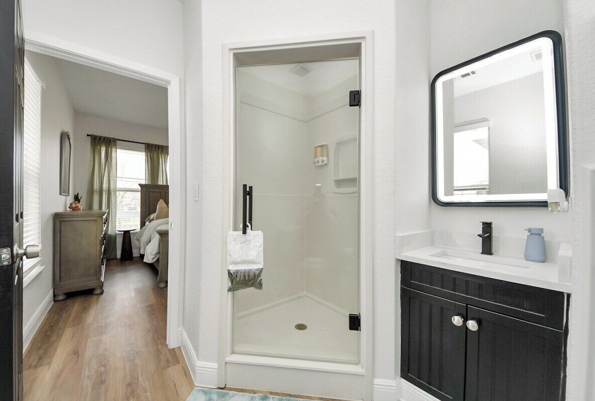 Shower, hair dryer, towels, shampoo