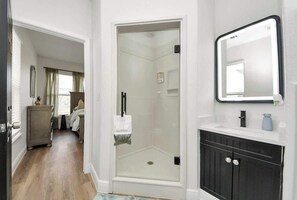 Shower, hair dryer, towels, soap