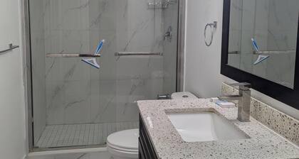 Queen bed occupancy with attached washroom - Close to YKF airport