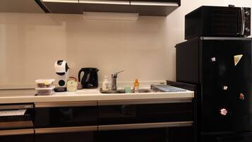 Fridge, microwave, cookware/dishes/utensils