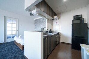 Fridge, microwave, cookware/dishes/utensils