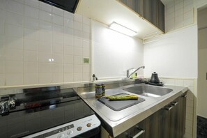 Fridge, microwave, cookware/dishes/utensils