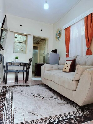 Apartment, Balcony, City View | Living area - Lux Suites Mancelona Flats Parklands (Nairobi)
