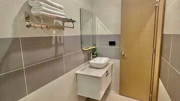 Shower, jetted tub, hair dryer, bidet
