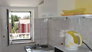 Departamento (One Bedroom Apartment 5) | Cocina privada | Refrigerador