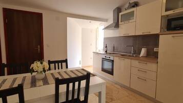 Apartment (Apartment with One Bathroom) | Private kitchen | Fridge