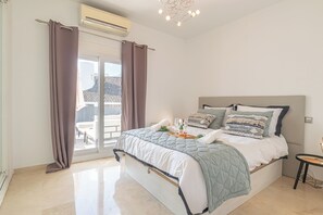 Family Apartment, Multiple Bedrooms, 2 Bathrooms (Puerto Banus Near La Sala By The Sea) | 2 bedrooms, laptop workspace, iron/ironing board, free WiFi