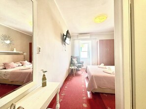 1 habitación, acceso a internet y ropa de cama