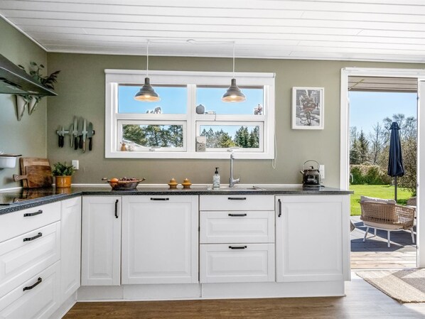 Fridge, microwave, dishwasher, cookware/dishes/utensils