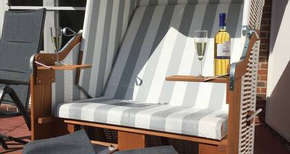 Ferienwohnung 'Urlaubsdomizil Dünenhof' mit Privatterrasse, Gemeinschaftsgarten und Wi-Fi