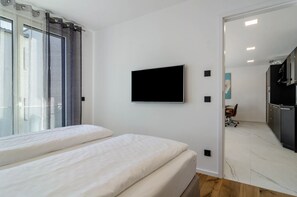 2 quartos, ferros/tábuas de passar roupa, Wi-Fi de cortesia