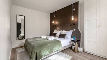 2 habitaciones, tabla de planchar con plancha, cuna de viaje y wifi