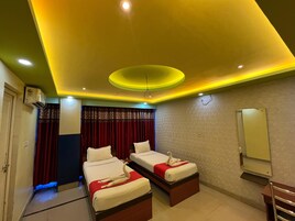 Economy Double or Twin Room, City View | In-room safe, desk, blackout drapes, free WiFi