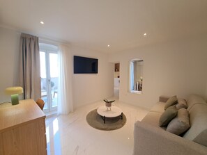 Superior Condo, 1 Bedroom, Non Smoking, Balcony | Living area | 55-inch Smart TV with satellite channels