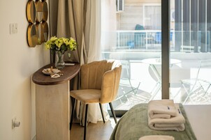 Premium bedding, Select Comfort beds, in-room safe, blackout drapes