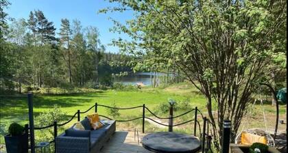 Cabin with own lake and palju hot tub