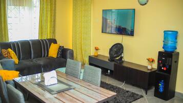 Family Apartment, Balcony, City View | Living area