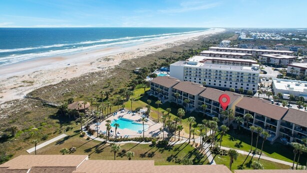 A resort with a pool, beach access, and a view of the ocean. - Ocean Villas 19 -3 bed, 2 bath Ground floor unit just steps to the zero entry (St. Augustine Beach)