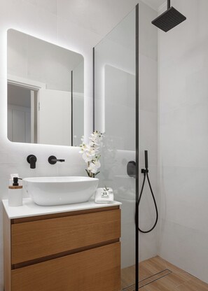 Shower, hair dryer, towels, soap