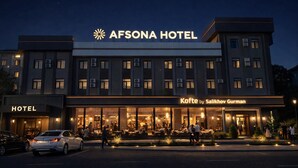 The AFSONA HOTEL with a visible restaurant named 'Kofte by Salikhov Gurman' on the ground floor. - Afsona hotel (Qarshi)