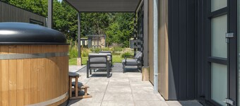 Luxury Batenburgh Deluxe with hot tub. Enjoy a hot tub, atmospheric outdoor space, and a lounge area with an outdoor fireplace.