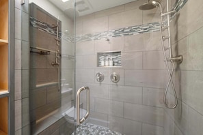 Shower, hair dryer, towels, shampoo