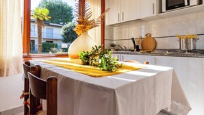Apartment, 2 Bedrooms, Garden View | Dining room - Cozy Flat With Shared Garden in a Charming Villa (San Michele al Tagliamento)