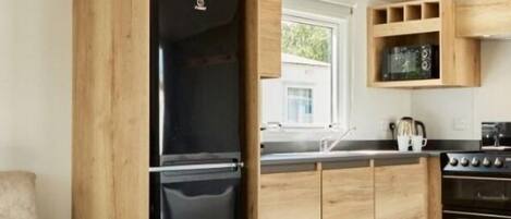 Fridge, microwave, cookware/dishes/utensils