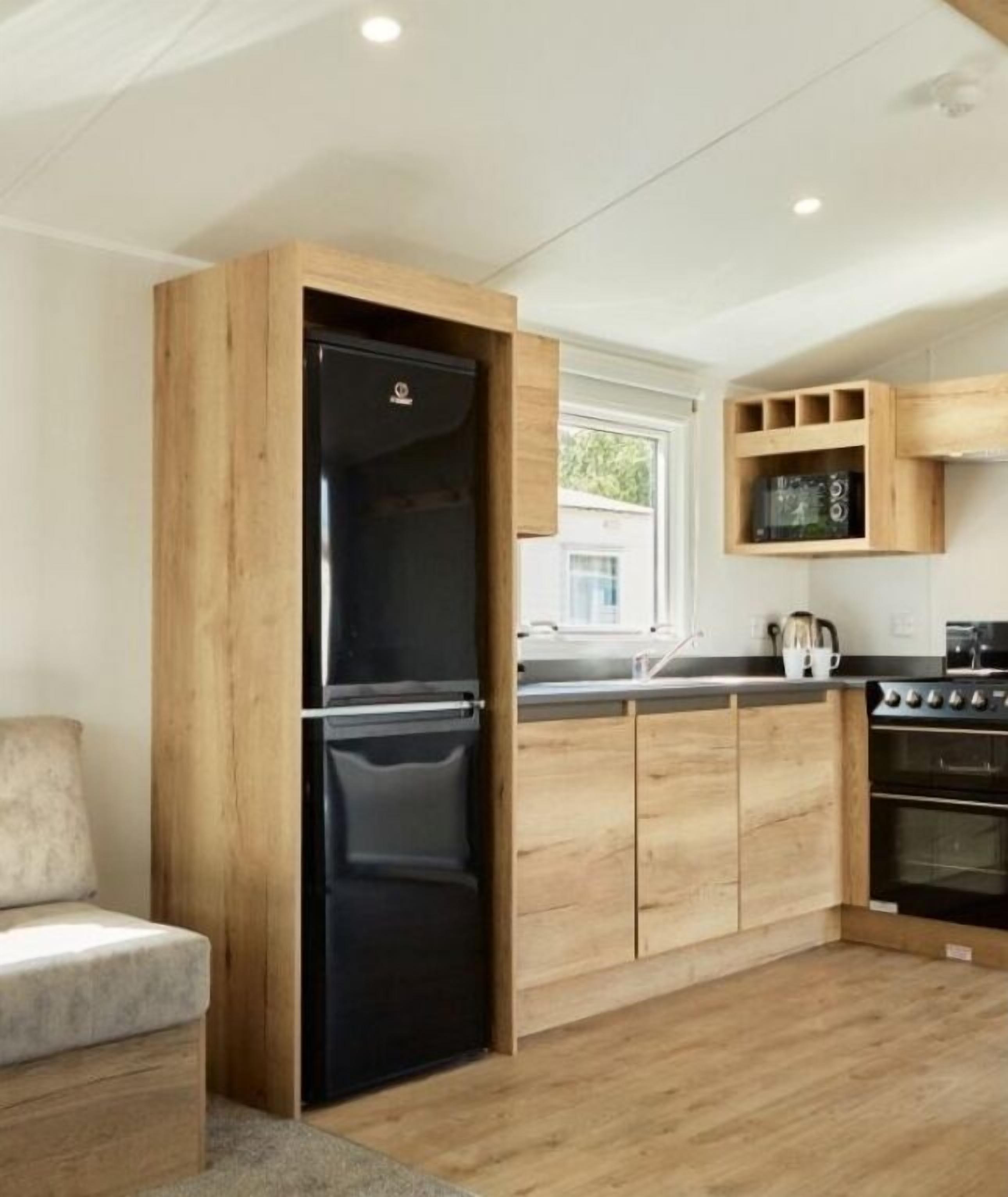 Fridge, microwave, cookware/dishes/utensils